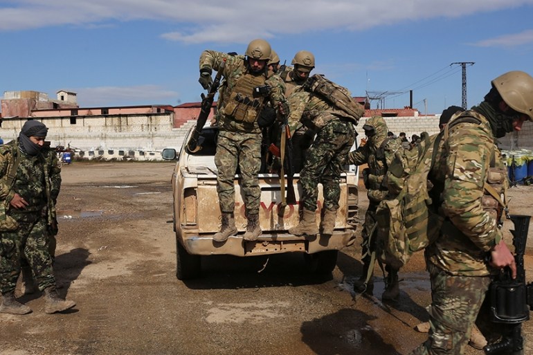 Turkish backed fighter prepare to go to the frontline in the Syrian province of Idlib, Monday, Feb. 10, 2020. The fighting in Idlib led to the collapse of a fragile cease-fire that was brokered by Tur