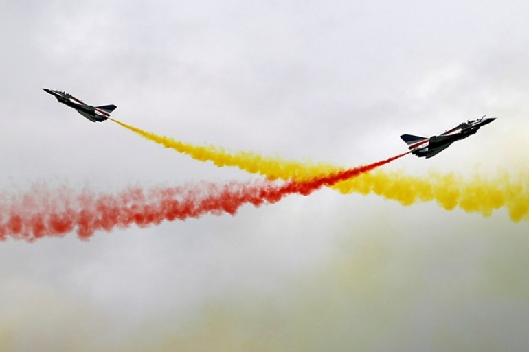 People''s Liberation Army Air Force (PLAAF) Ba Yi aerobatics team perform an aerial display at the Singapore Airshow in Singapore