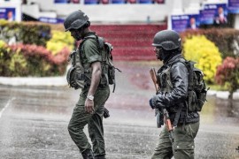 Members of the Cameroonian Gendarmerie patrols in the Omar Bongo Square of Cameroon&#39;s majority anglophone South West province capital Buea on October 3, 2018 during a political rally of the ruling party [File: Marco Longari/AFP]