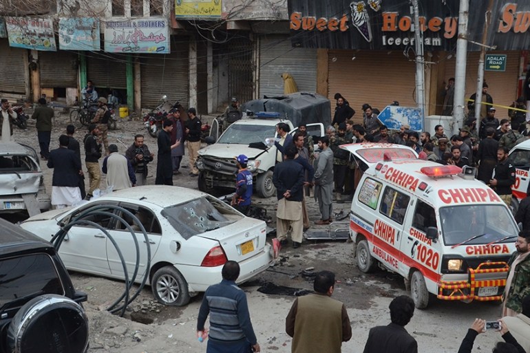epa08223847 Pakistani security officials inspect the scene of a bomb blast in Quetta, Pakistan, 17 February 2020. According to reports, at least 10 people were killed and more than 30 injured when a b