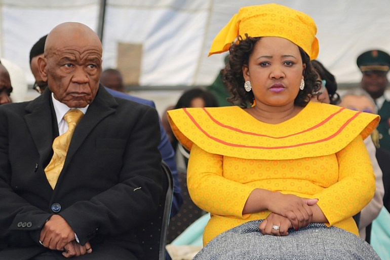 Newly appointed Lesotho prime Minister Thomas Thabane (L), leader of the All Basotho Convention (ABC) political party, his wife ''Ma Isaiah Ramoholi Thabane and Zambian President Edgar Lungu (R) attend