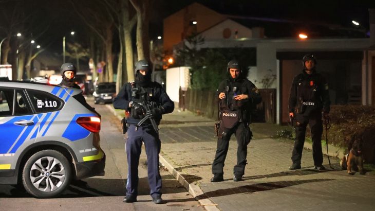 Police officers are seen after a shooting in Hanau near Frankfurt