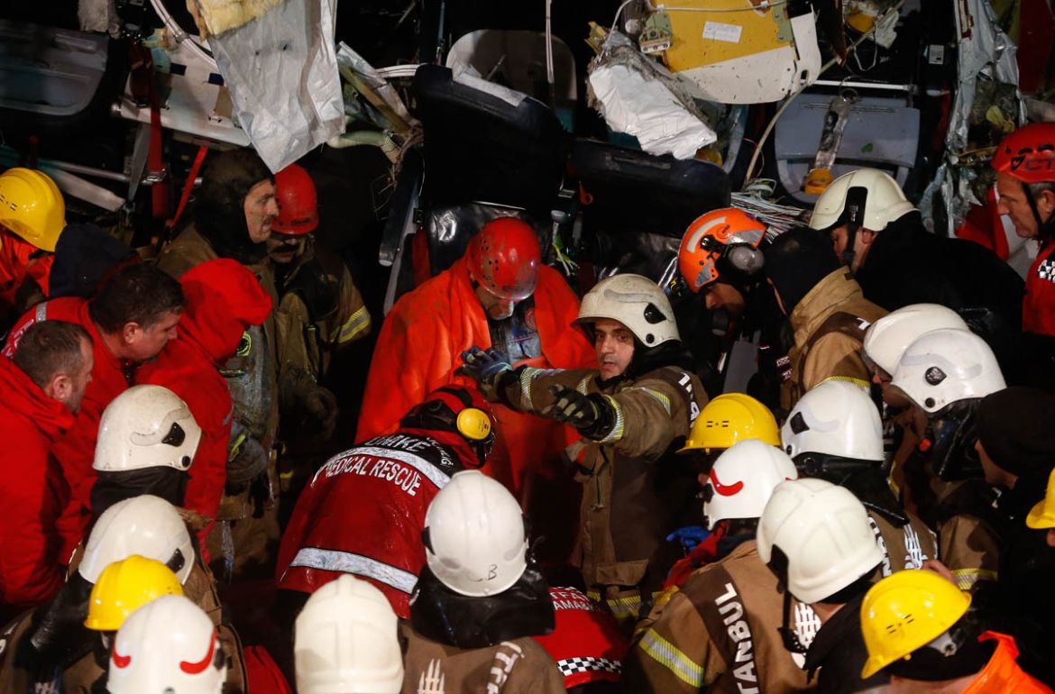 Rescue members evacuate an injured person from the wreckage of a plane after it skidded off the runway at Istanbul''s Sabiha Gokcen Airport, in Istanbul, Wednesday, Feb. 5, 2020. The plane skidded off
