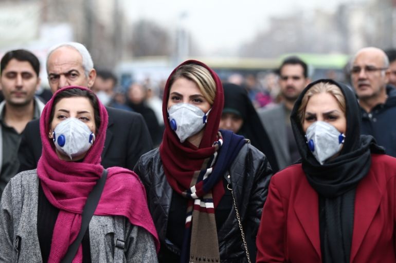 Iranian women wearing protective masks to prevent contracting a coronavirus walk at Grand Bazaar in Tehran, Iran February 20, 2020. WANA (West Asia News Agency)/Nazanin Tabatabaee via REUTERS ATTENTIO
