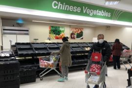 Empty Chinese vegetable shelves in Hong Kong supermarket