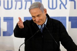Israeli Prime Minister Benjamin Netanyahu gestures as he speaks during an event marking Tu BiShvat, the Jewish Arbor Day, in the Israeli settlement of Mevo''ot Yericho, in the occupied West Bank