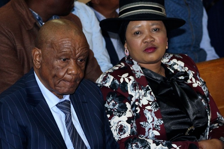 Lesotho’s Prime Minister, Thomas Thabane, left, and his wife Maesaiah, right, in court in Maseru, Monday, Feb. 24, 2020. Thabane appeared in court but the murder case against him failed to proceed as