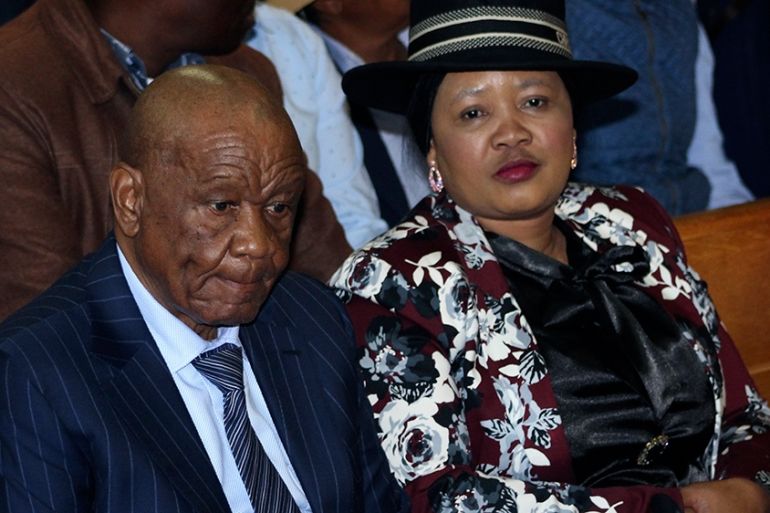 Lesotho’s former Prime Minister, Thomas Thabane, left, and his wife Maesaiah, right, in court in Maseru, Monday, Feb. 24, 2020. Thabane appeared in court but the murder case against him failed to proceed as