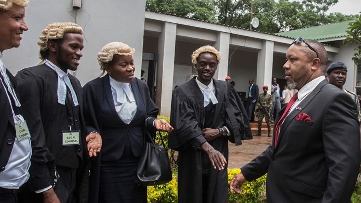 Re-instated Malawi''s Vice President Saulos Klaus Chilima (R) greets lawyers on February 3, 2020, in Lilongwe, prior a to Malawi constitutional court ruling which annulled the results of a May 2019 vot