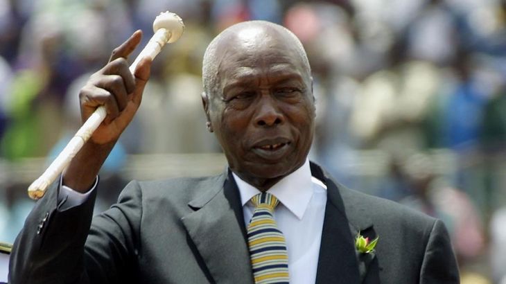 (FILES) In this file photo taken on October 09, 2001 Kenyan president, Daniel Arap Moi, waves to the crowd while he enters in the National Stadium to celebrates Moi''s day in Nairobi Kenya 10 October,