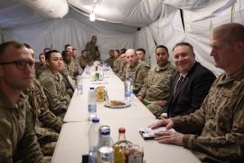 U.S. Secretary of State Mike Pompeo shares lunch at the mess with members of the military as he visits the Prince Sultan air base in Al-Kharj, Saudi Arabia February 20, 2020.