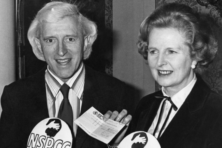 British Prime Minister Margaret Thatcher with English dj and television presenter Jimmy Savile (1926 - 2011) at an NSPCC (National Society for the Prevention of Cruelty to Children) fundraising presen