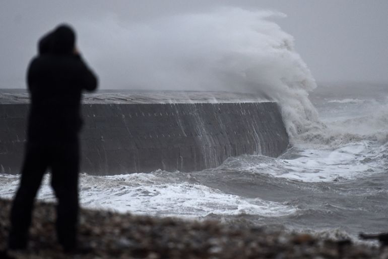LYME REGIS, ENGLAND, - FEBRUARY 09: Storm Ciara arrives with waves hitting the Cobb on February 09, 2020 in Lyme Regis, United Kingdom. Amber weather warnings are in place as gusts of up to 90mph and