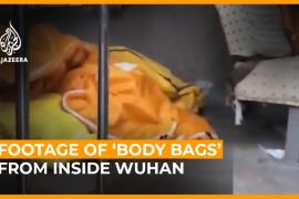 Footage of ''body bags'' from inside Wuhan
