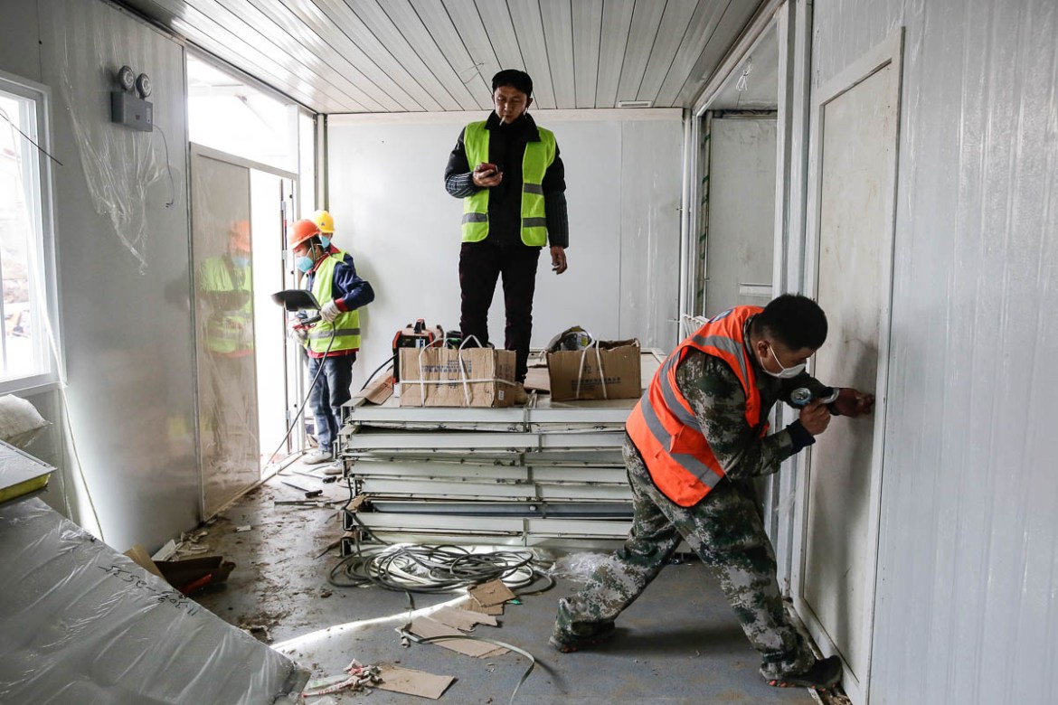 WUHAN, CHINA - FEBRUARY 03: Workers build hospital on February 3, 2020 in Wuhan, China. After only 10 days of construction, Wuhan Huoshenshan Hospital was officially completed and delivered, and on Fe