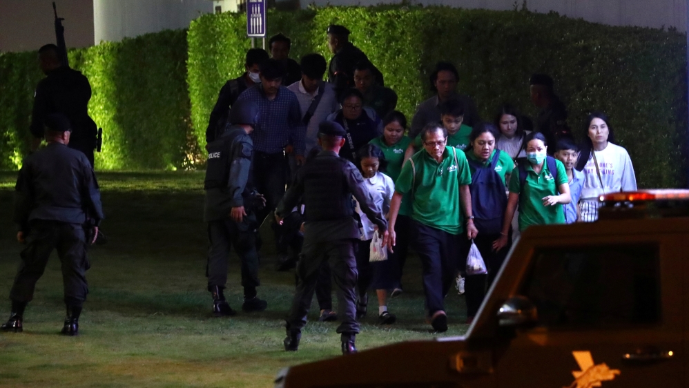 Thailand security forces evacuated people from a shopping mall as they chase a shooter hidden in after a mass shooting in front of the Terminal 21, in Nakhon Ratchasima, Thailand