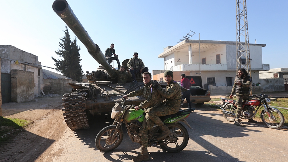 Turkish backed Syrian rebels enter the own of Saraqeb, in Idlib province, Syria, Thursday, Feb. 27, 2020. Turkey-backed Syrian opposition fighters Thursday retook a strategic northwestern town iof Sar