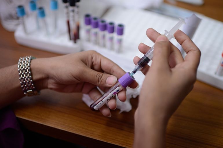 Bangladesh coronavirus test kit [Mahmud Hossain Opu/Al Jazeera]