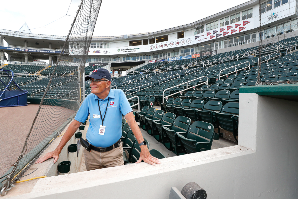 Hammond Stadium usher Ken Trammell looks out on an empty stadium, Thursday, March 12, 2020, in Fort Myers, Fla. Major League Baseball has suspended the rest of its spring training game schedule becaus