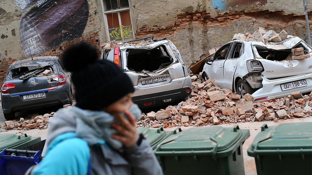 Damaged cars are seen following an earthquake, in Zagreb, Croatia March 22, 2020. REUTERS/Antonio Bronic