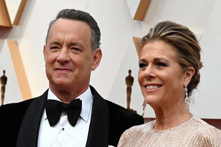 (FILES) In this file photo US actor Tom Hanks and wife Rita Wilson arrive for the 92nd Oscars at the Dolby Theatre in Hollywood, California on February 9, 2020. - Tom Hanks and his wife Rita Wilson ha