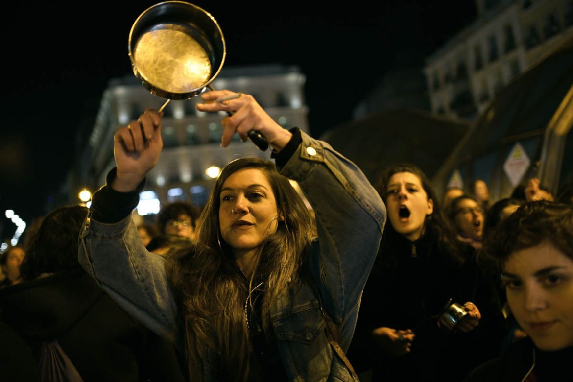 Women bang pots and pans shouting angry slogans during the cacerolada (a pot-banging protest) at the Sol square in Madrid on 8th March, 2020. International Women''s Day. (Photo by Juan Carlos Lucas/Nur