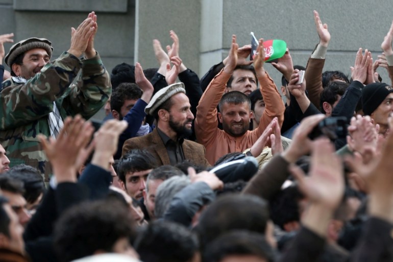 Supporters of Afghanistan''s Abdullah Abdullah, attend his swearing-in ceremony as president, in Kabul