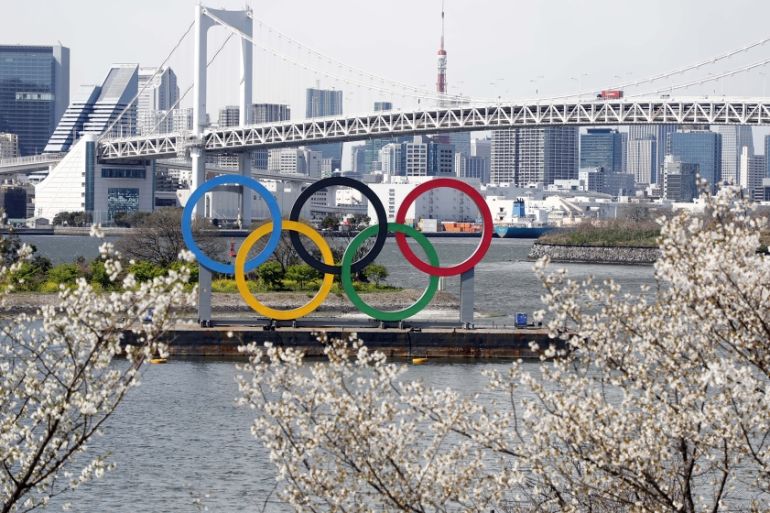 Mar 24, 2020; Tokyo, Japan; Olympic rings monument at Rainbow Bridge, Odaiba, Tokyo. On Monday the IOC announced that the Tokyo 2020 Summer Olympics Games would be postponed due to the COVID-19 corona