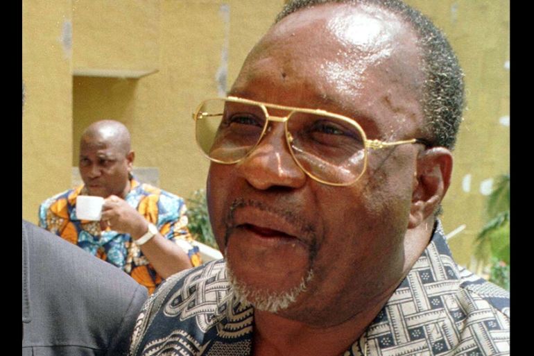 Former Congo Republic leader, Jacques-Joachim Yhomby-Opango, speaks to reporters while in exile in Ivory Coast October 28. Yhomby Opango, a former prime-minister, put his name to a call by the ousted
