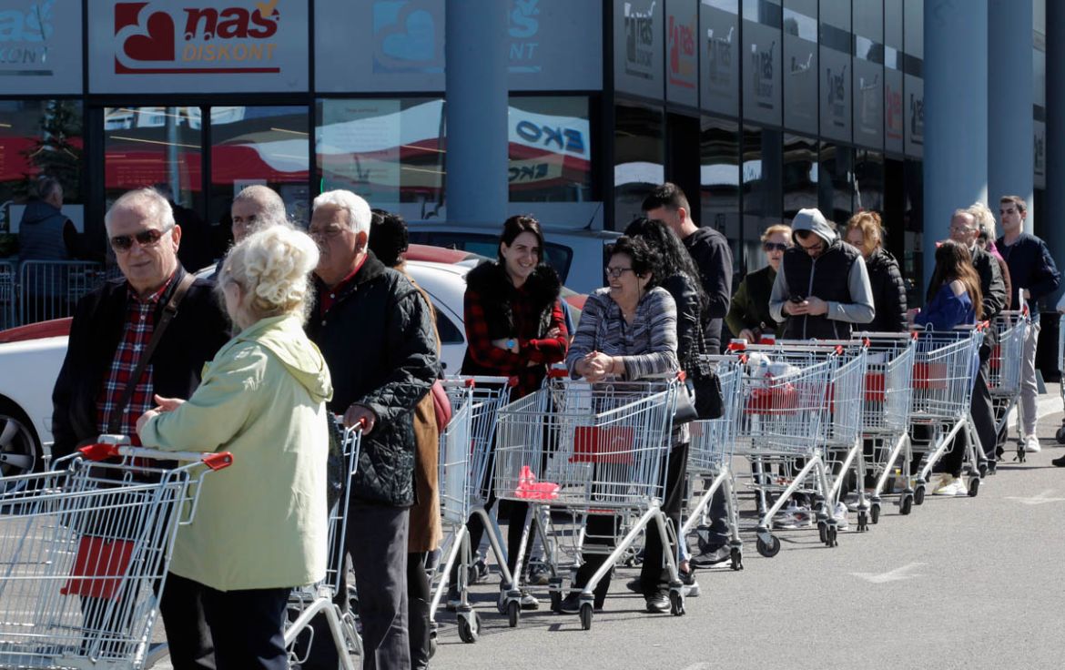 People wait in line after the government limits the number of customers in supermarkets to 50 at a time due to coronavirus (COVID-19) threat in Podgorica, Montenegro March 16, 2020. REUTERS/Stevo Vasi