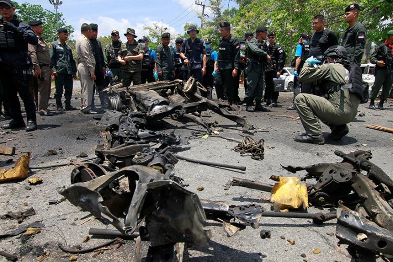 Security personnel inspect the site of a car bomb after if exploded in front of the government''s Southern Border Provinces Administrative Centre in Yala, Thailand March 17, 2020. REUTERS/Surapan Boont