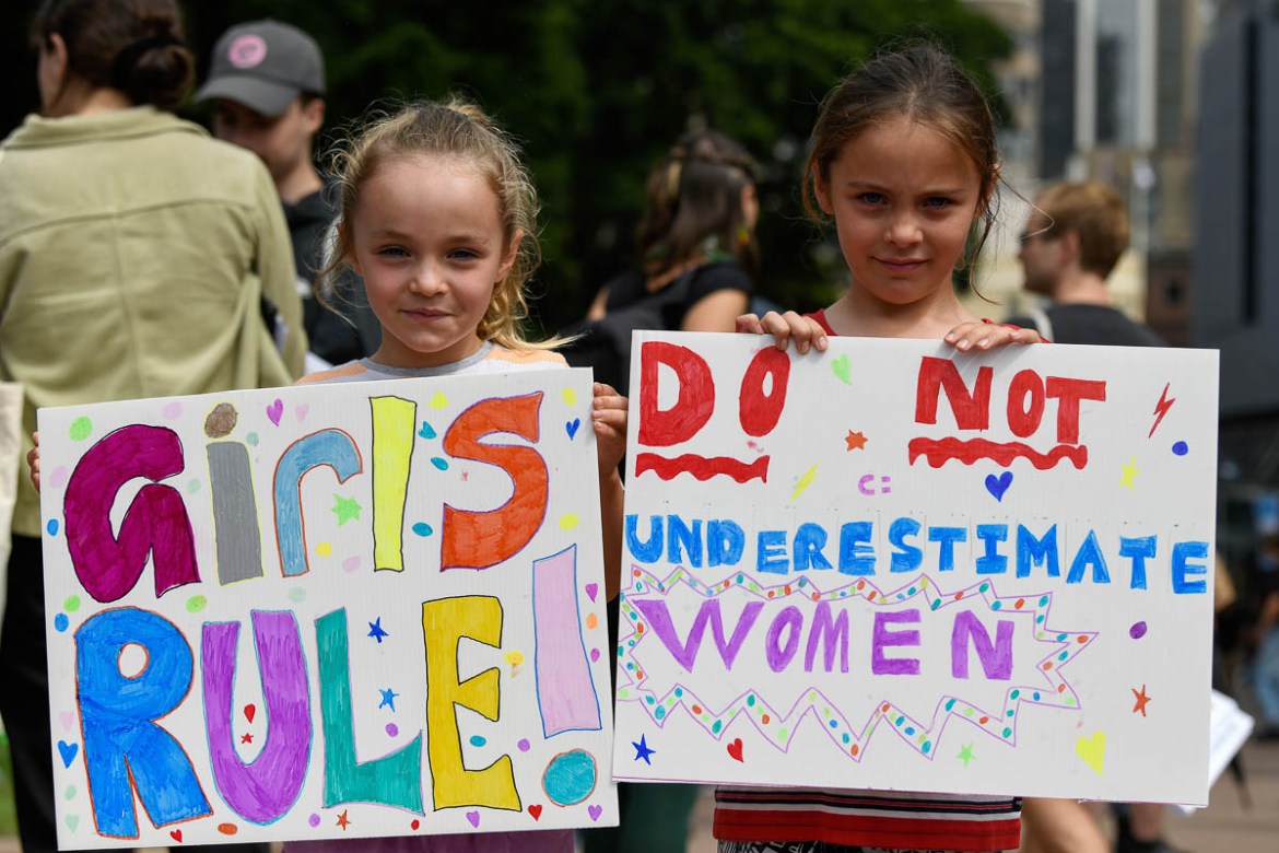 epa08275798 Young girls hold placards during a march ahead of the International Women''s Day 2020, in Sydney, Australia, 07 March 2020. International Women''s Day, marked worldwide on 08 March every yea