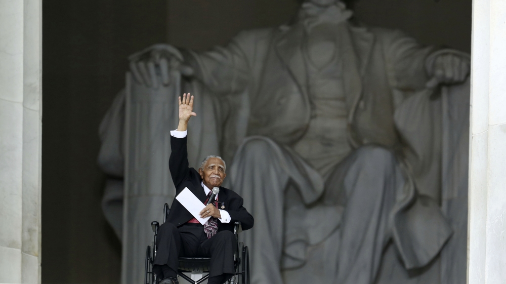 Joseph Lowery waves at the Lincoln Memorial in Washington