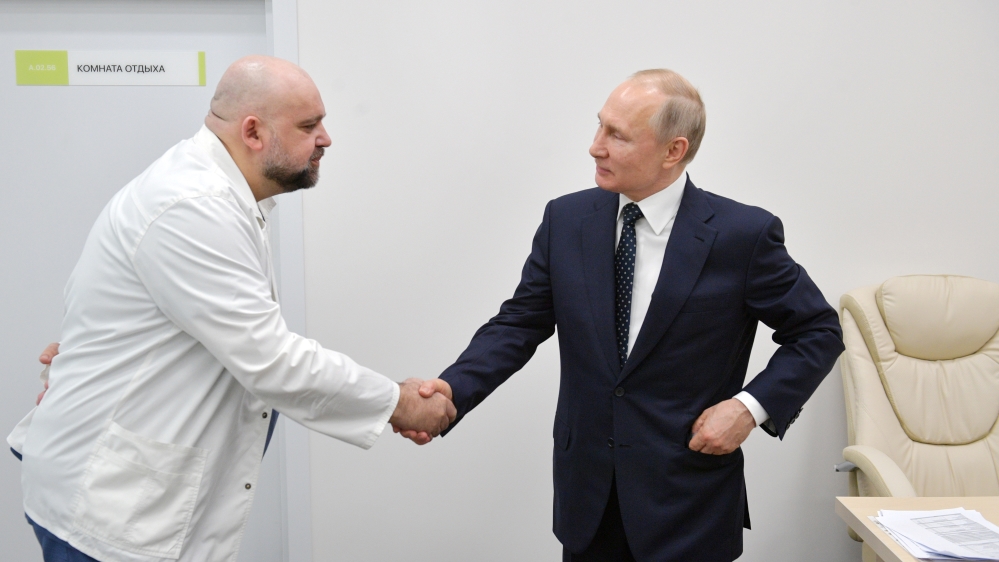 Russian President Putin visits a hospital for patients infected with coronavirus disease (COVID-19) on the outskirts of Moscow