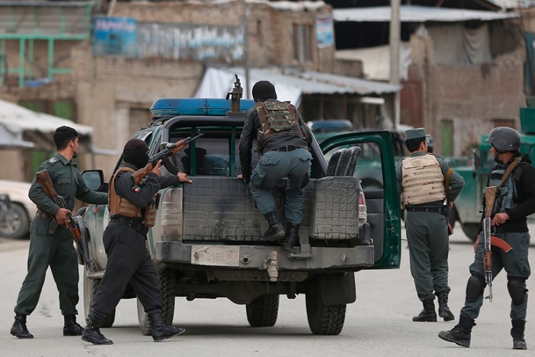 Afghan personnel arrive at the site of an attack in Kabul, Afghanistan, Wednesday, March 25, 2020. Gunmen stormed a religious gathering of Afghanistan''s minority Sikhs in their place of worship in the