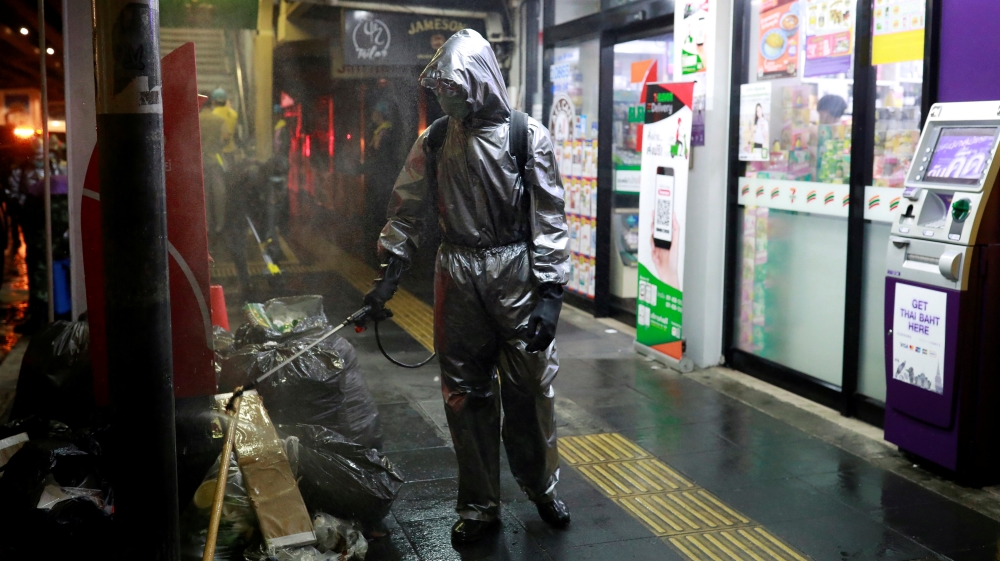 A Royal Thai Army soldier sanitizes in the city due to the coronavirus disease (COVID-19) outbreak in Bangkok