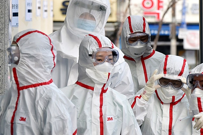 Medical staffs in protective gears arrive for a duty shift at Dongsan Hospital in Daegu, South Korea, Tuesday, March 3, 2020. China''s coronavirus caseload continued to wane Tuesday even as the epidem