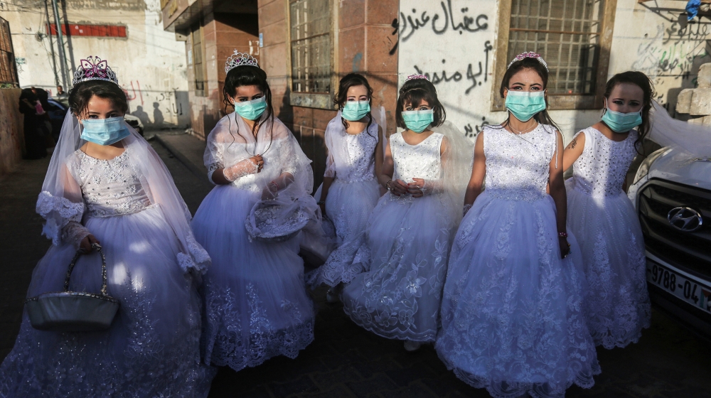 Amid coronavirus fears, Gaza couples downsize, delay ...