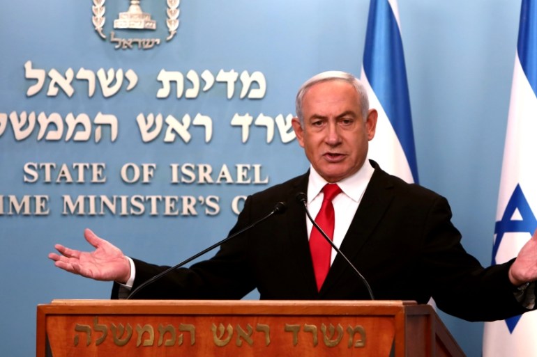 Israeli Prime Minister Benjamin Netanyahu delivers a speech at his Jerusalem office