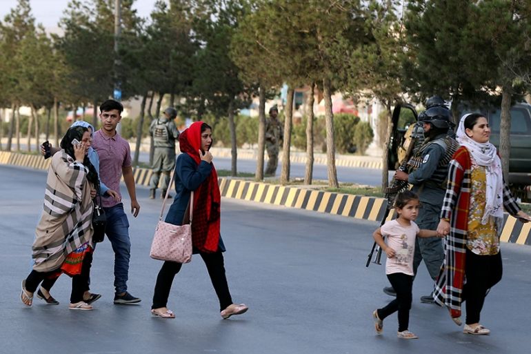 A family leaves the site of a powerful blast in Kabul, Afghanistan July 28, 2019. REUTERS/Omar Sobhani