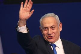 Israeli Prime Minister Benjamin Netanyahu addresses his supporters after first exit poll results for Israeli elections in Tel Aviv, Israel, Monday, March 2, 2020. (AP Photo/Oded Balilty)
