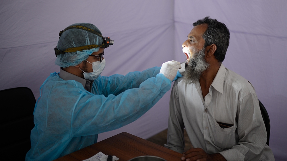 Bangladesh coronavirus test kit [Mahmud Hossain Opu/Al Jazeera]