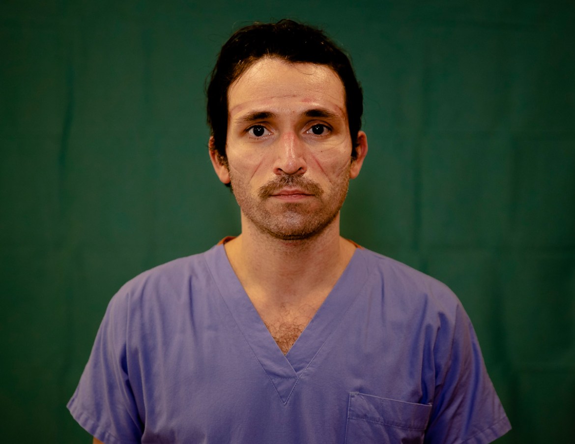 Doctor Luca Tarantino, 37, an electrophysiologist at the Humanitas Gavazzeni Hospital in Bergamo, Italy poses for a portrait at the end of his shift Friday, March 27, 2020. The intensive care doctors