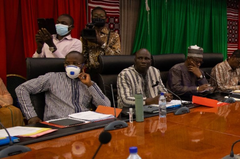 BFASO-HEALTH-VIRUS Stanislas Ouaro (wearing a mask), Burkina Faso Minister of Education, takes part in the first session of the Burkina Faso National Commettee on COVID-19 Epidemic