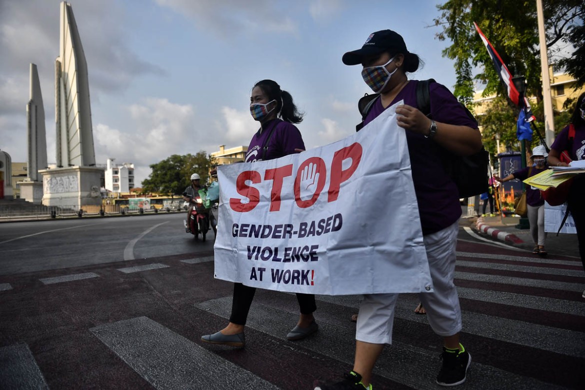 Members of Thai labour rights groups and state enterprise unions march for labour rights in front of Democracy Monument on International Womeni´s Day in Bangkok on March 8, 2020. (Photo by Lillian SUW