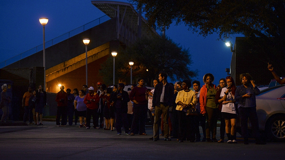 Voters wait in line to cast their ballot in the Democratic primary at a polling station in Houston, Texas, U.S. March 3, 2020. REUTERS/Callaghan O'Hare