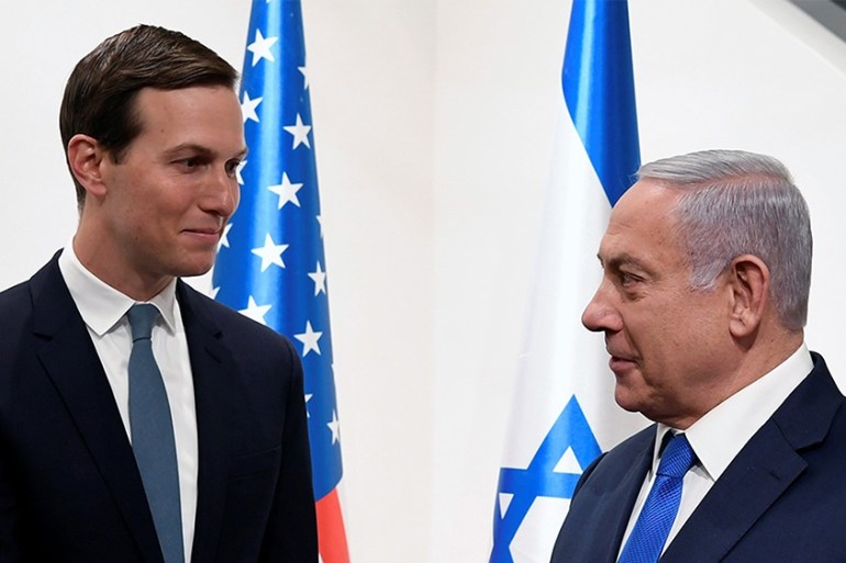 This handout picture provided by the US Embassy in Jerusalem, shows Israeli Prime Minister Banjamin Netanyahu (R) shaking hands with the US president''s son-in-law and adviser Jared Kushner in the holy