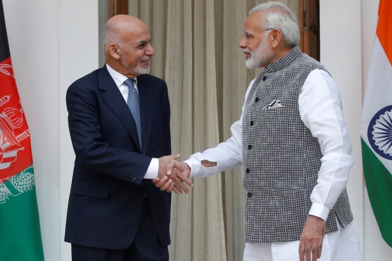 Afghanistan''s President Ghani shakes hands with India''s PM Modi during a photo opportunity before their meeting at Hyderabad House in New Delhi