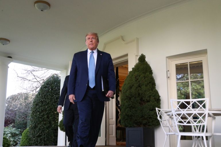 U.S. President Trump heads out of the Oval Office to hold the daily coronavirus outbreak task force briefing in Washington