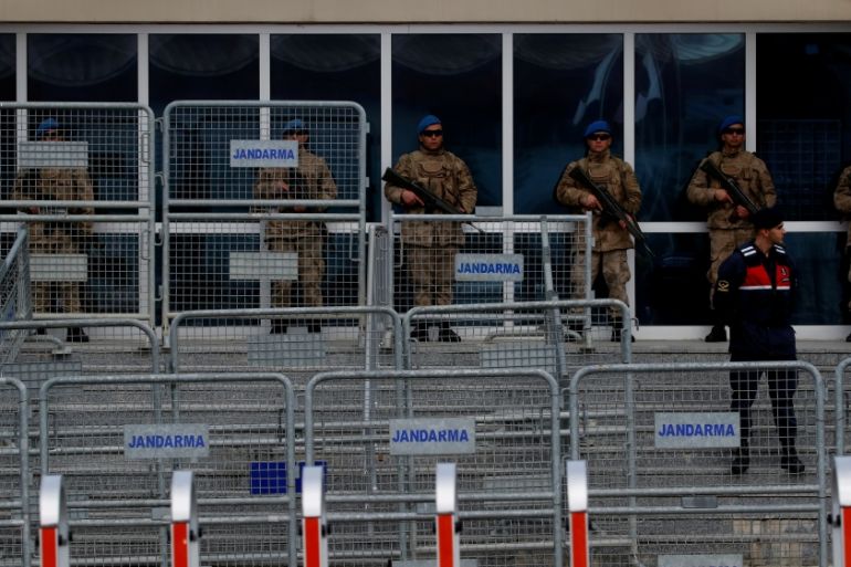 Turkish soldiers stand guard outside a courtroom at the Silivri Prison and Courthouse complex in Silivri near Istanbul